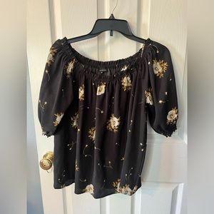 Black blouse dress it up or dress it down.  Very cute off the shoulder